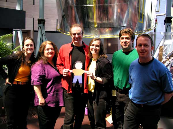 The Chromies pose with Flat Stanley