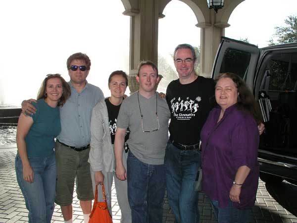 the chromatics standing outside the hotel, next to the van